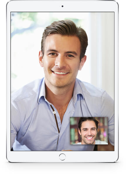 Man smiling on tablet